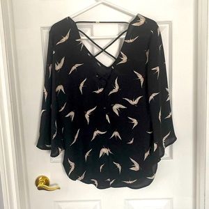 Dynamite printed  top with wonderful details on back. 100% polyester.Medium